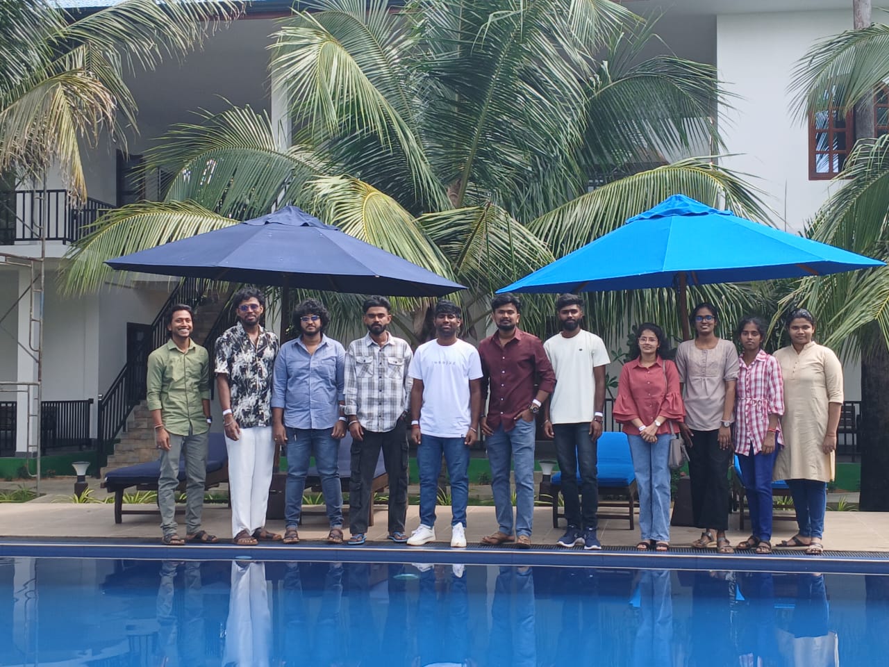 QTechy year end celebration 2025 poolside group photo